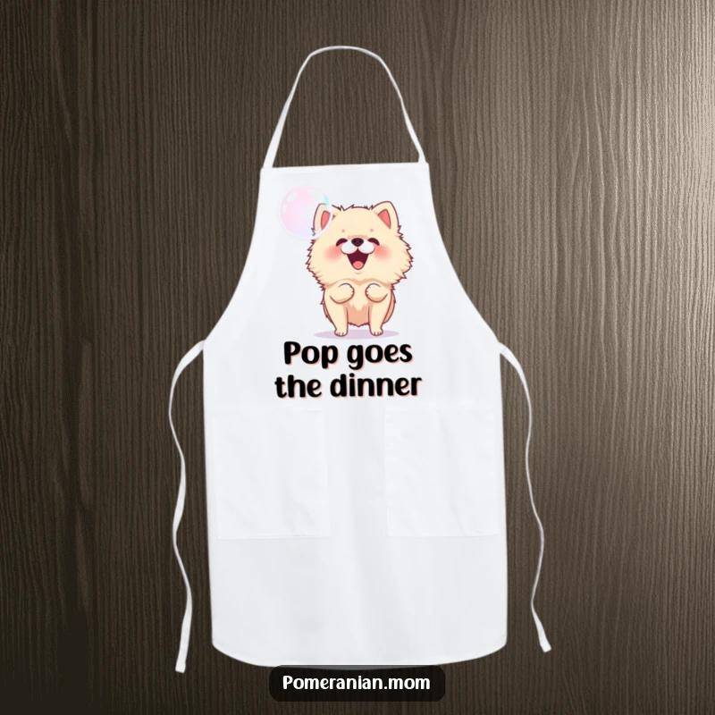 Funny Pomeranian apron depicting an energetic dog barking at a floating bubble, suitable for chefs who love playful kitchen humor.