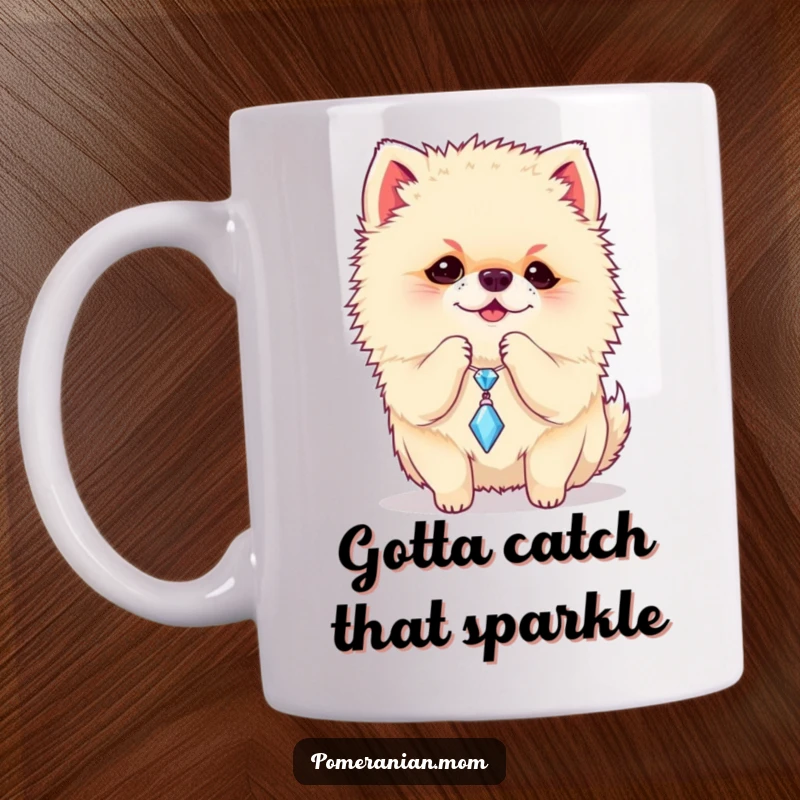 Funny Pomeranian mug showing a playful dog batting at a dangling sparkly charm, a humorous and cute scene.