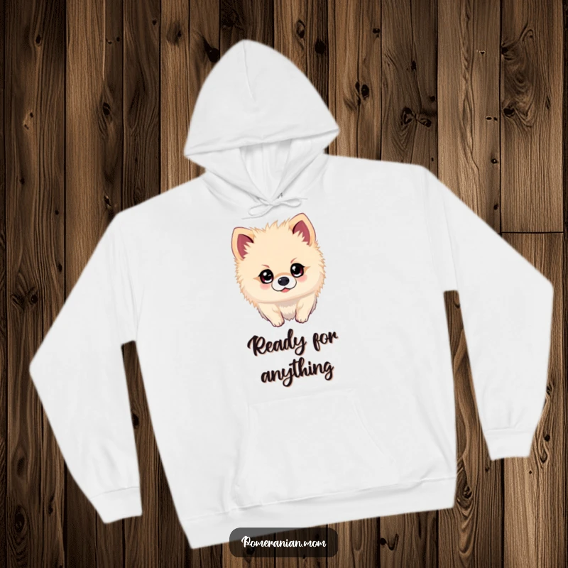 Funny Kawaii Pomeranian Hoodie: Dog with sparkling eyes, ready for adventure, exuding joy and humor.