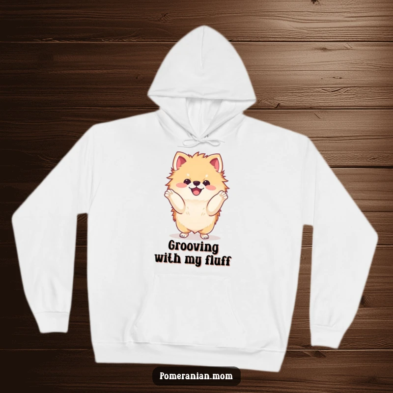 Funny kawaii Pomeranian doing a delighted dance with its paws hoodie, showcasing playful doggy moves and cozy comfort, a warm gift.