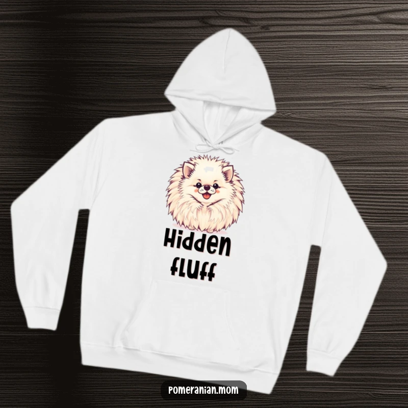 Funny Pomeranian Hoodie showcasing a happy Pomeranian peeking playfully from behind a large, cheerful pompom.