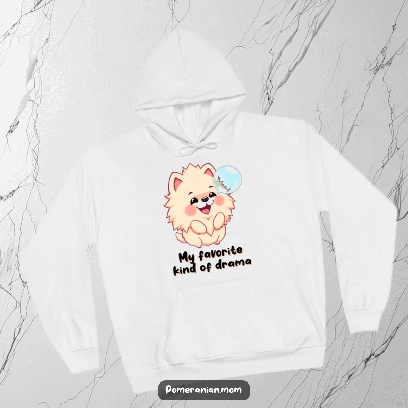 Funny hoodie depicting a kawaii Pomeranian joyfully barking at a floating bubble, its fluffy mane looking extra adorable.