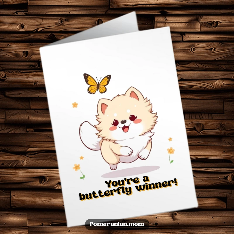 Funny Free Printable Congrats Card: A Kawaii Pomeranian hilariously chases a butterfly, capturing boundless playful energy.