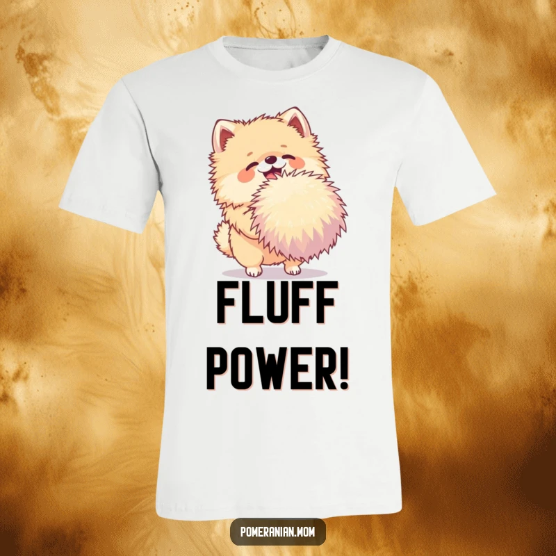 Funny Pomeranian t-shirt featuring a joyful dog shaking a very large pom-pom, perfect for expressing playful energy.