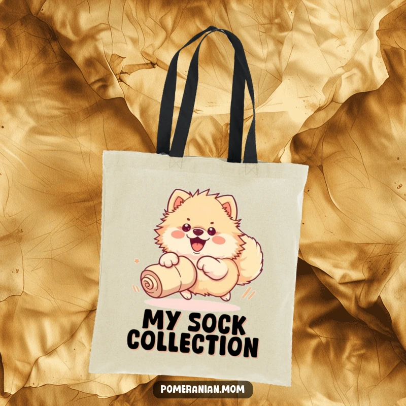 Funny tote bag with a kawaii Pomeranian enthusiastically chasing a rolled-up sock with its whole body, perfect for carrying treasures.