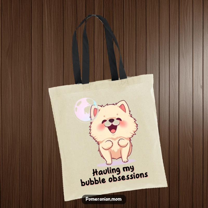 Funny Pomeranian tote bag illustrating an energetic dog barking at a floating bubble, embodying playful curiosity and fun.